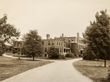 View of Waverley Hall in 1933. The 1903 addition is in the foreground, with the taller 1891 structure behind it. From the General Photographic Collection: Massachusetts: Standard-size photographs, 1860s-2000s: Massachusetts: Waltham: "Mass School for Feeble-Minded (Fernald)": Thompson and Thompson Images; Courtesy of Historic New England.